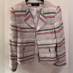 Tahari Arthur S. Levine Open Front Blazer.
Two front zipper functional pockets.